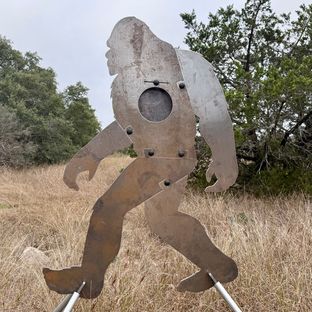 AR500 Steel Sasquatch/Bigfoot silhouette target in a natural outdoor setting